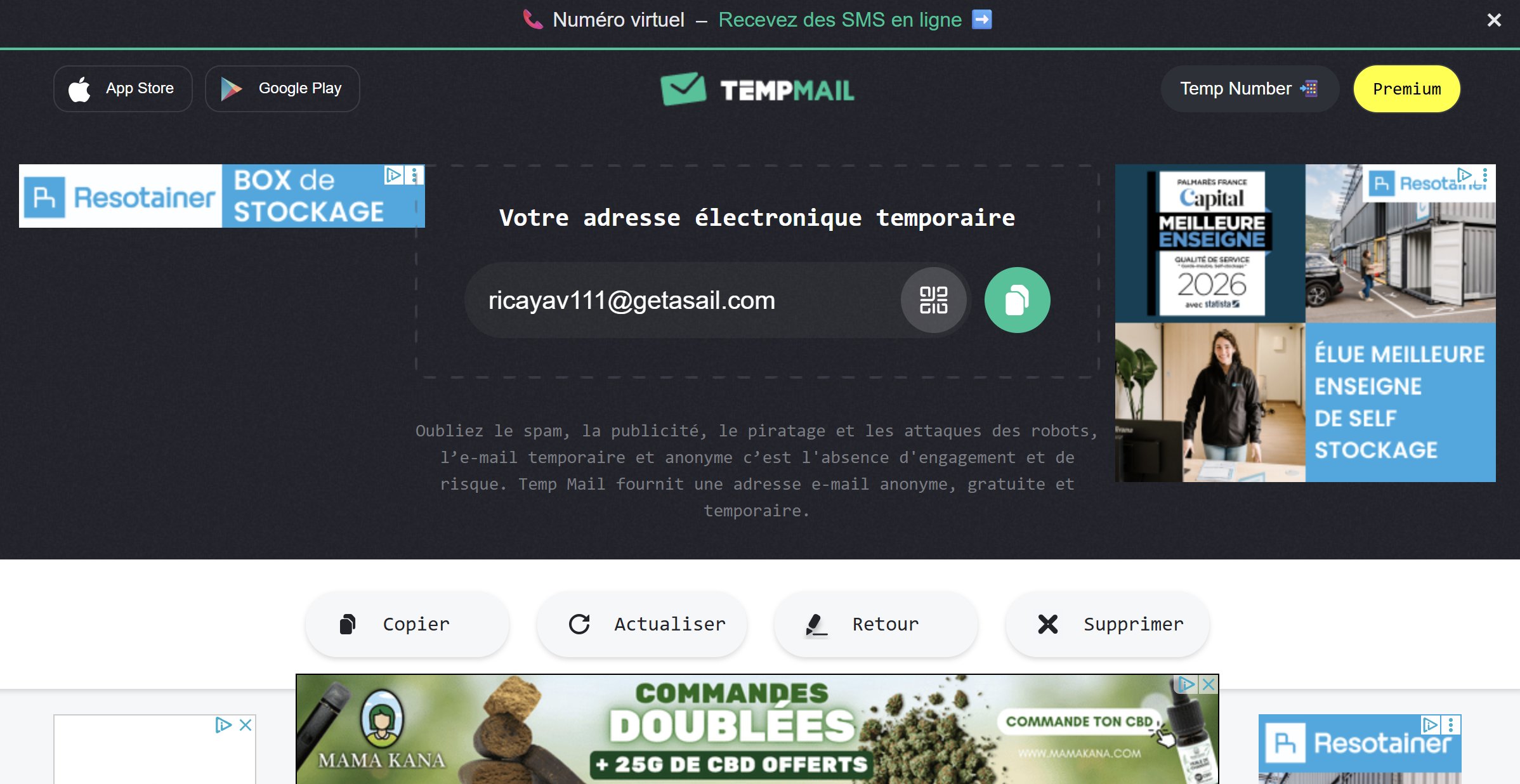 Temp-Mail home page in May 2026, saturated with advertising